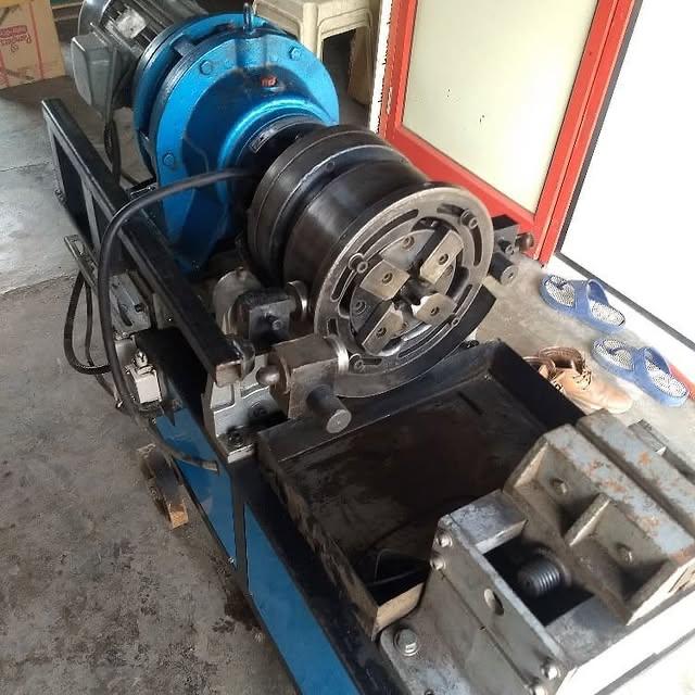 Threaded coupler and rebar